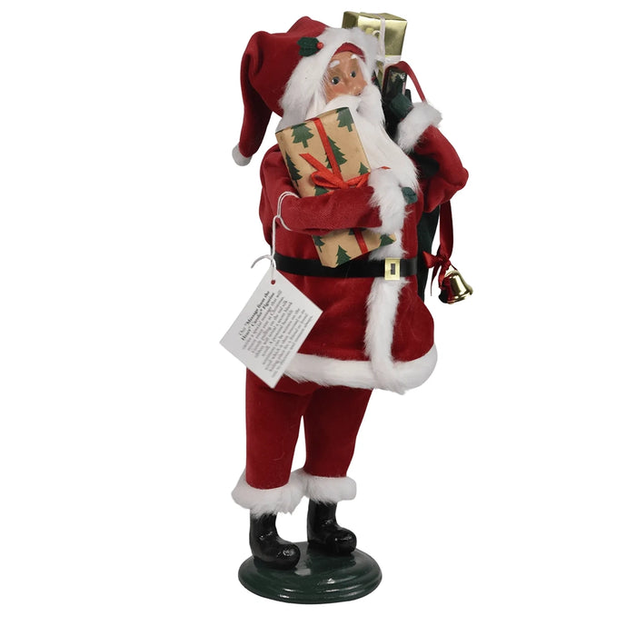 Left side Byers' Decorative figure of Santa Claus holding gifts and a sack on a white background