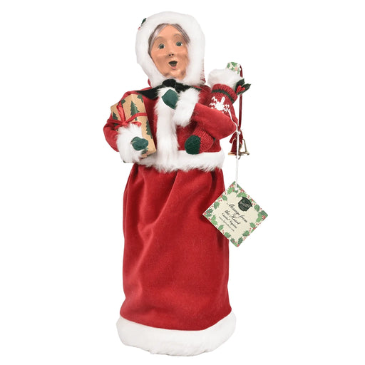Byers' Choice Red Velvet Message Mrs. Claus figurine holding a red stocking with a hidden holiday message scroll, dressed in red velvet and white fluff.