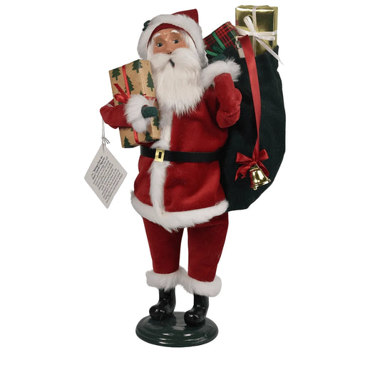 Byers' Decorative figure of Santa Claus holding gifts and a sack on a white background