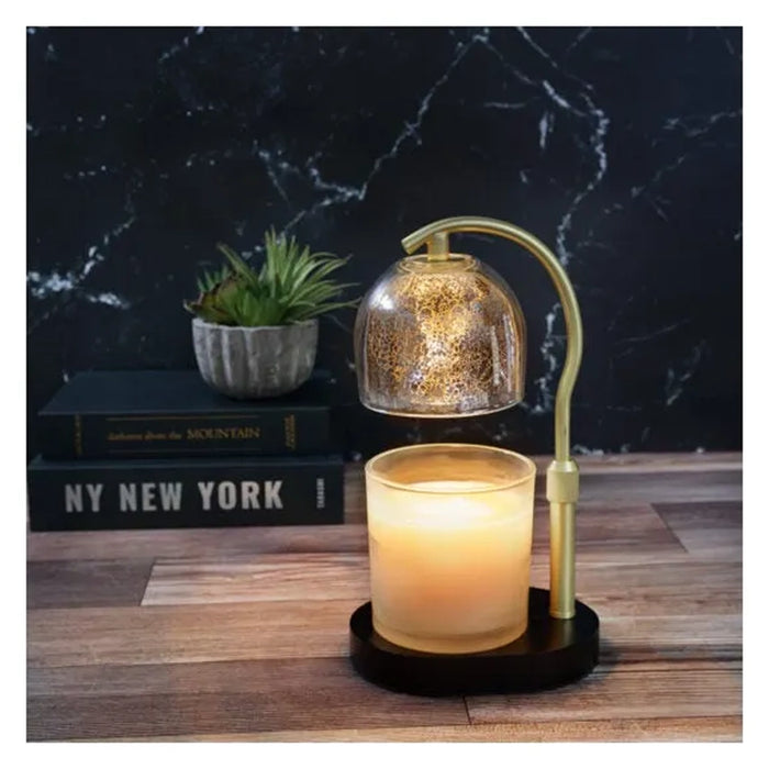 Elegant gold mercury glass candle warmer shaped like a small lamp, used to melt jar candles without a flame.