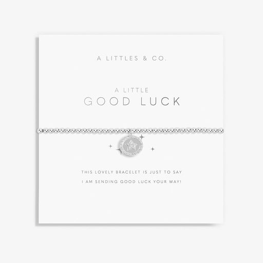 A Littles & Co. A Little Good Luck Bracelet on sentiment card with silver star charm