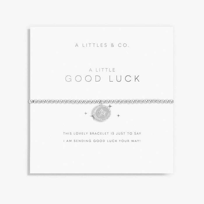 A Littles & Co. A Little Good Luck Bracelet on sentiment card with silver star charm