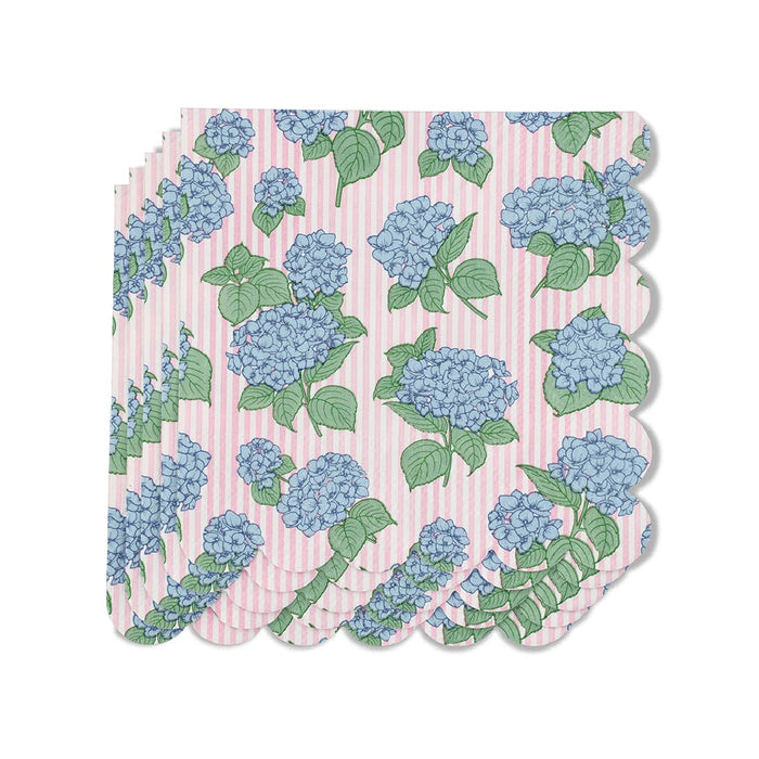  A napkin featuring a floral design with blue and pink flowers arranged elegantly across its surface.