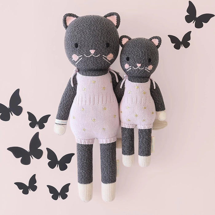 Cuddle + Kind Nova the Kitten dolls in regular 20 inch and little 13 inch sizes, handmade gray kitten with pink overalls.