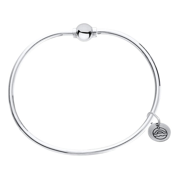 Silver bracelet with a heart-shaped tag on a white background