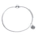 Silver bracelet with a heart-shaped tag on a white background