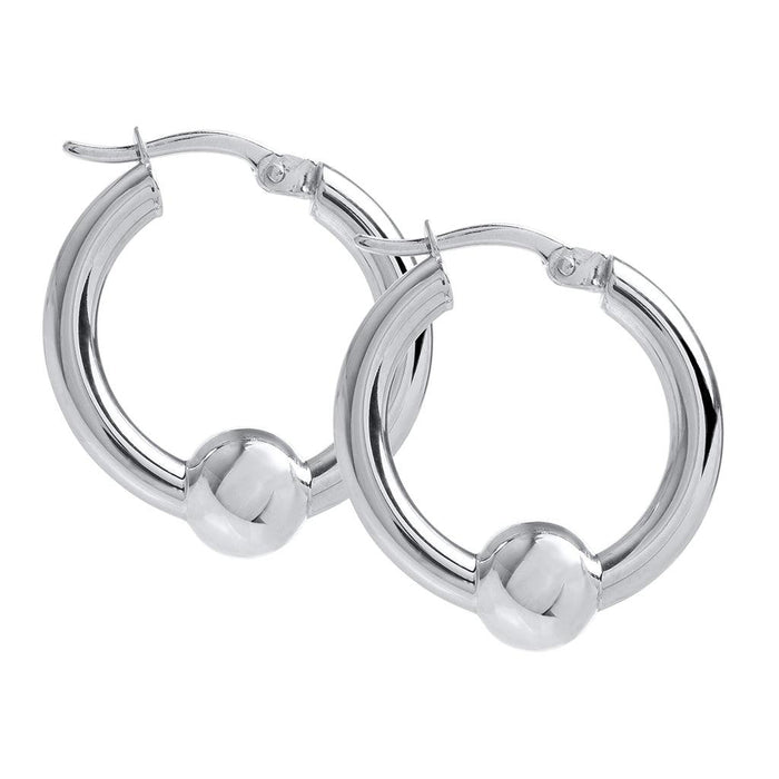 Pair of silver hoop earrings on a white background