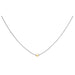 Necklace with a small gold bead on a white background