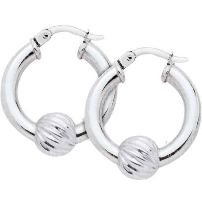 Silver hoop earrings with ball accents on a white background