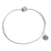 Silver bracelet with a heart-shaped tag on a white background