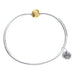 Silver bracelet with a gold accent on a white background
