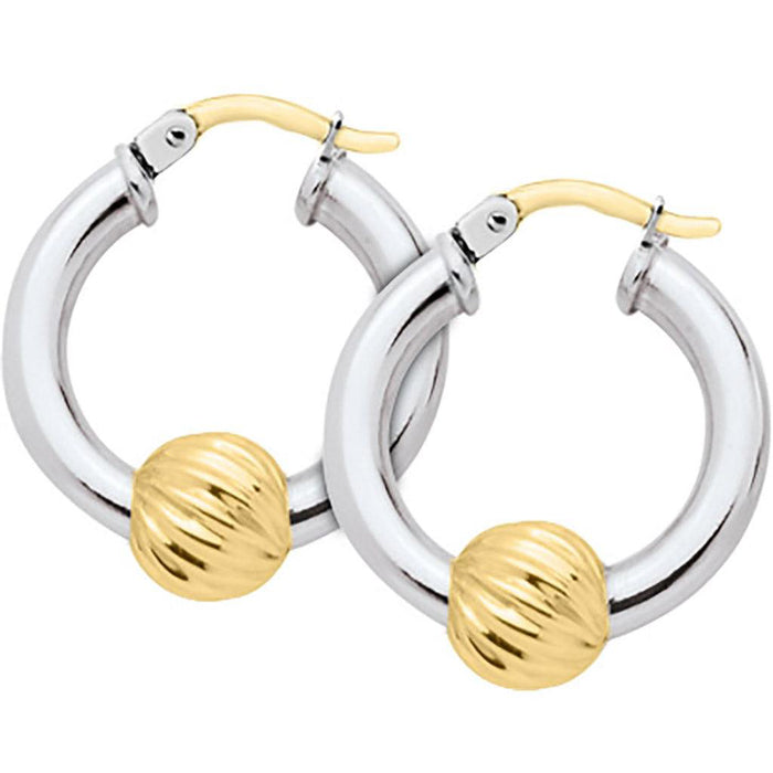 Pair of hoop earrings with gold and silver finish on a white background