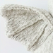 Close-up detail of the knitted wing on the Cuddle + Kind Baby Bat in Grey stuffed toy.