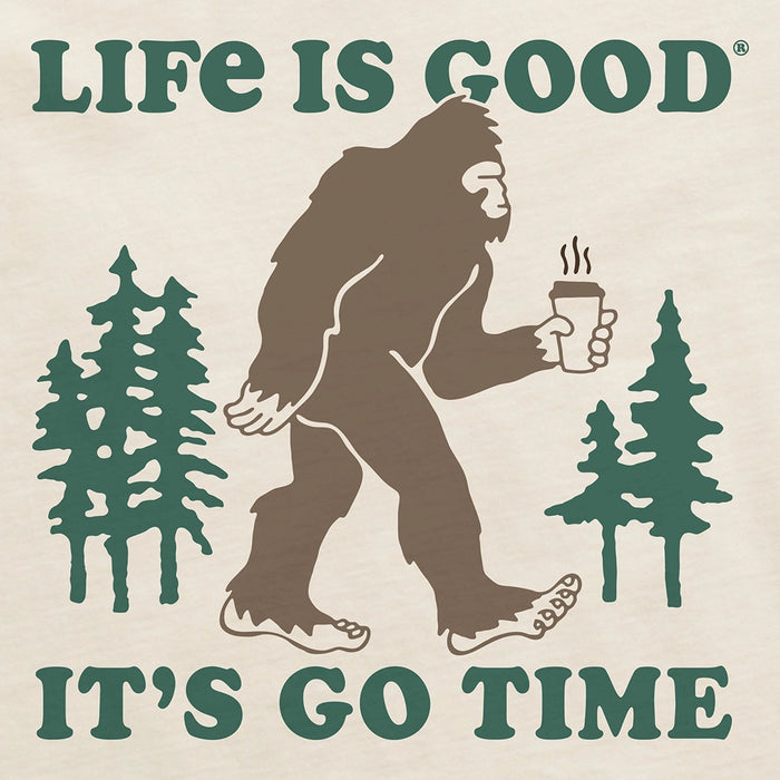 Close-up of Life Is Good It’s Go Time graphic showing Bigfoot walking with coffee among forest trees.