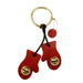 Red mitten-shaped keychain with gold buttons on a white background