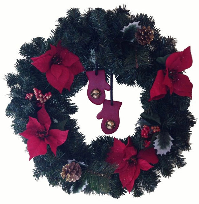 Christmas wreath with red poinsettias, pinecones, and mittens on a white background