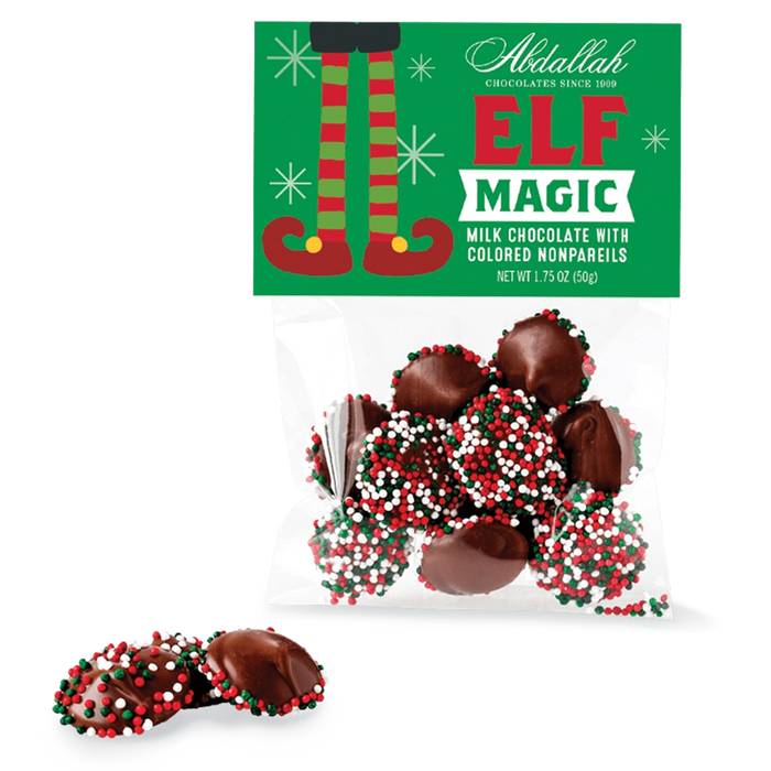 Bag of Abdallah Candies Elf Magic Milk Chocolate Nonpareils with red, white, and green sprinkles in festive holiday packaging.
