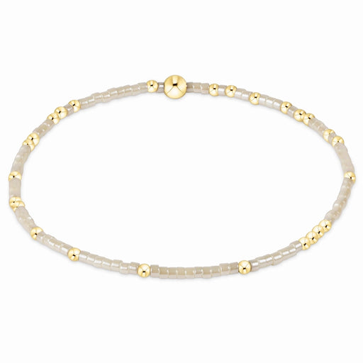 enewton design Hope Unwritten Bracelet featuring milkshake seed beads with 14k gold-filled accents displayed in a circular layout on a white background.