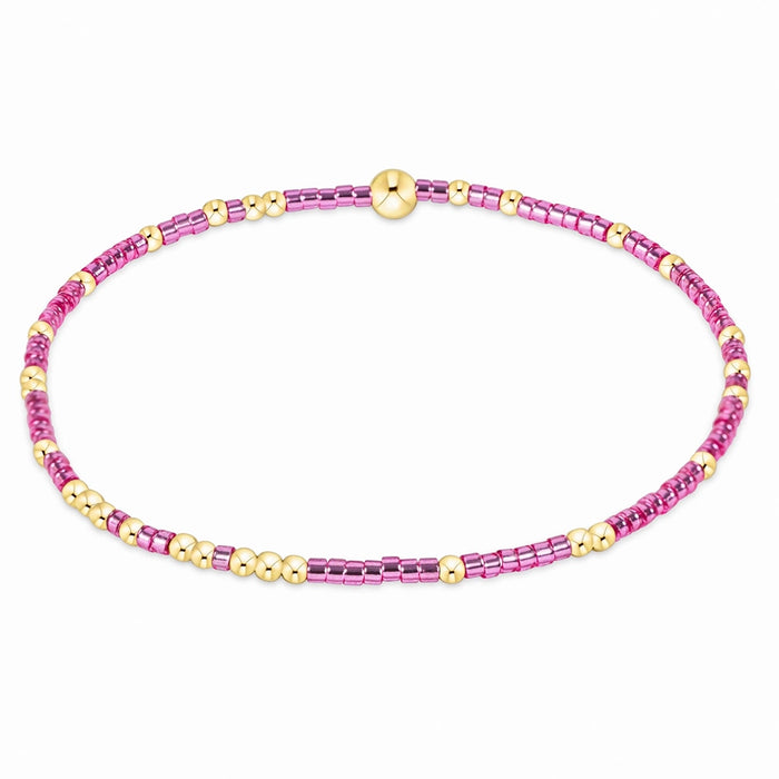 enewton design Hope Unwritten Bracelet featuring Pink metallic seed beads with 14k gold-filled accents displayed in a circular layout on a white background.