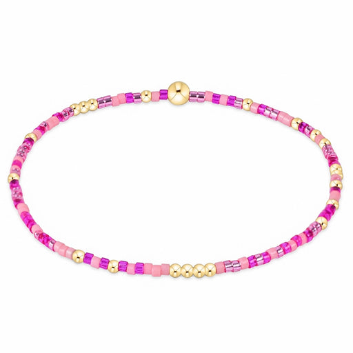 enewton design Hope Unwritten Bracelet featuring fuchsia seed beads with 14k gold-filled accents displayed in a circular layout on a white background.