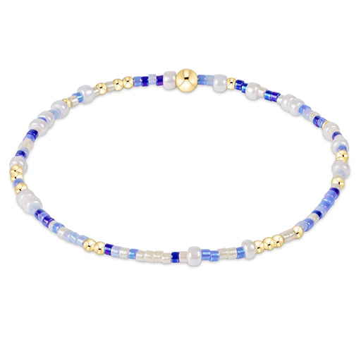 enewton design Hope Unwritten Bracelet featuring mix blue seed beads with 14k gold-filled accents displayed in a circular layout on a white background.