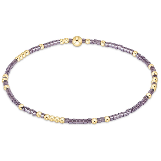 enewton design Hope Unwritten Bracelet in taupe with a twist featuring taupe glass beads and 14k gold-filled accents in a stretch beaded design.