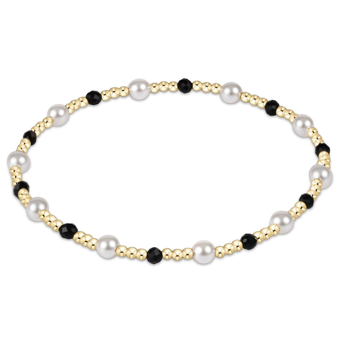 enewton design Pearl Sincerity Pattern Bead Bracelet with gold-filled beads, freshwater pearls and faceted black onyx.