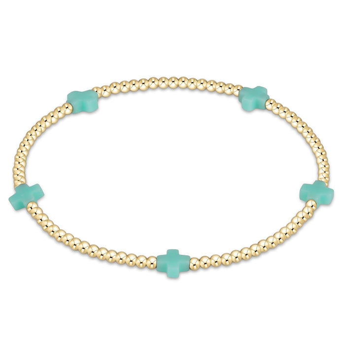 enewton design Signature Cross Pattern Bracelet with gold beads and mint cross accents on white background
