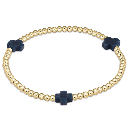 enewton design Signature Cross Pattern Bracelet with gold beads and navy cross accents on white background