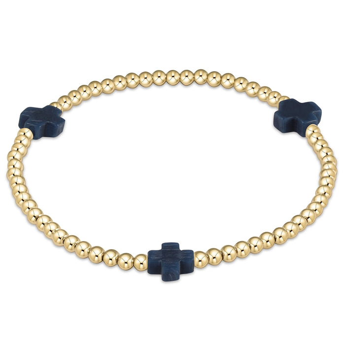 enewton design Signature Cross Pattern Bracelet with gold beads and navy cross accents on white background