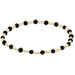 enewton Sincerity Pattern Bead Bracelet with faceted black onyx beads and 14k gold-filled beads arranged in a repeating pattern on a stretch band.