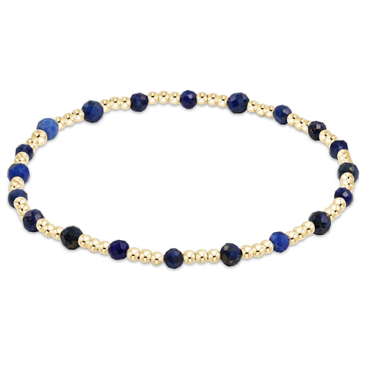 enewton Sincerity Pattern Bead Bracelet with lapis gemstone beads and 14k gold-filled beads arranged in a repeating pattern on a stretch band.