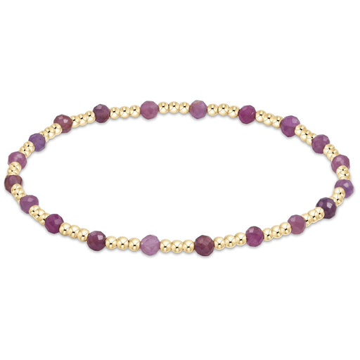 enewton Sincerity Pattern Bead Bracelet with Ruby beads and 14k gold-filled beads arranged in a repeating pattern on a stretch band.