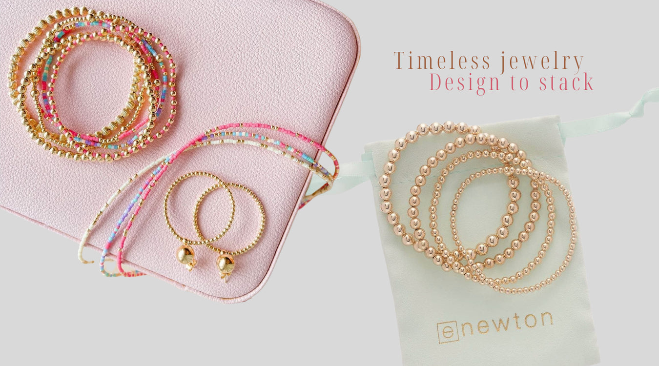 enewton gold bracelets on a pink jewelry box and pouch with 'enewton' branding.