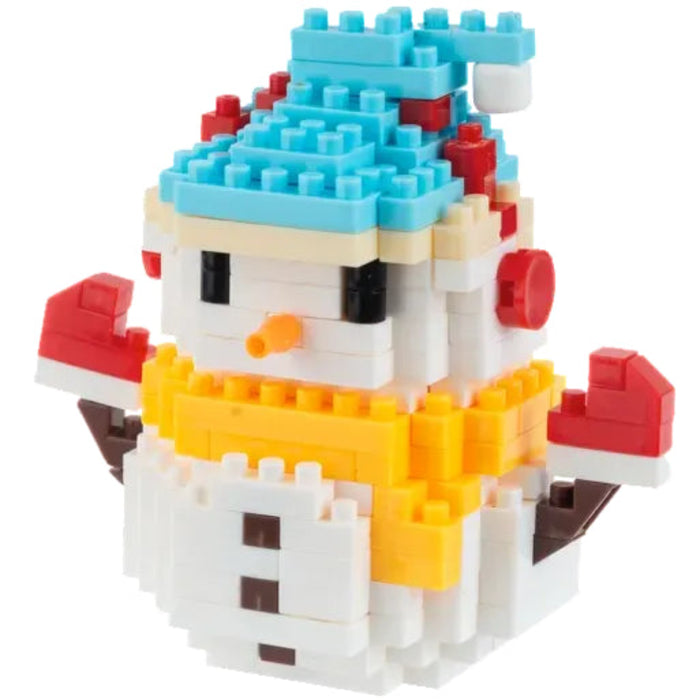 A small snowman toy built from tiny interlocking blocks, with a light blue hat, red gloves, yellow scarf, and white body, shown on a plain white background.