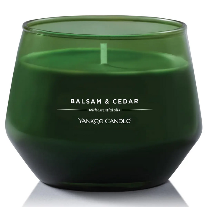 Yankee Candle Balsam & Cedar unlit in green glass jar