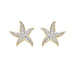 Star-shaped earrings with diamond accents on a white background