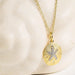 White Sapphire Sand Dollar Necklace on a light background