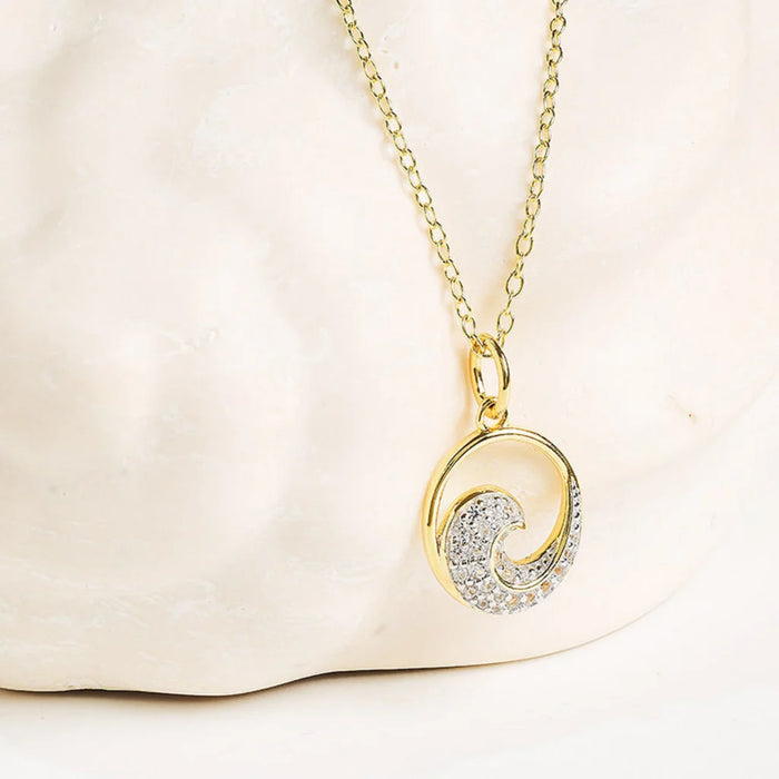 White sapphire wave shaped necklace  on a clean background