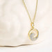 White sapphire wave shaped necklace  on a clean background