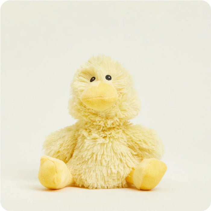 Yellow plush duck toy on a white background