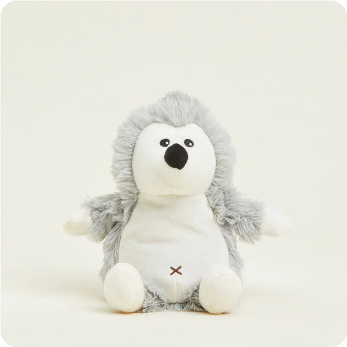 Plush toy hedgehog on a white background