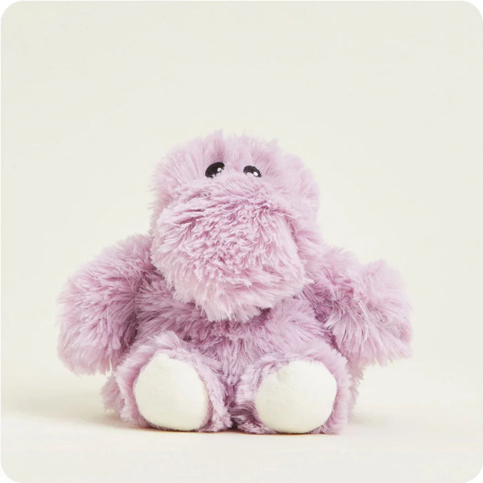 Pink plush toy on a light beige background