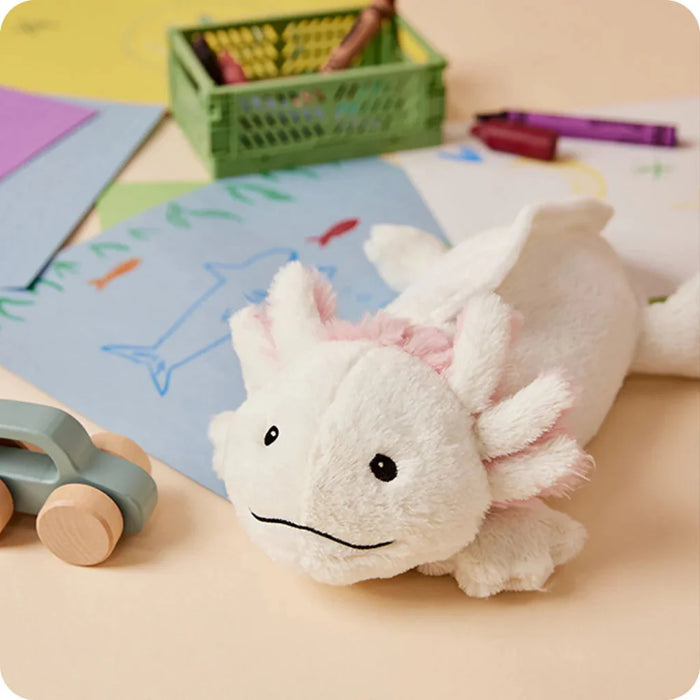 Warmies : Axolotl Warmies Junior on table with crayons