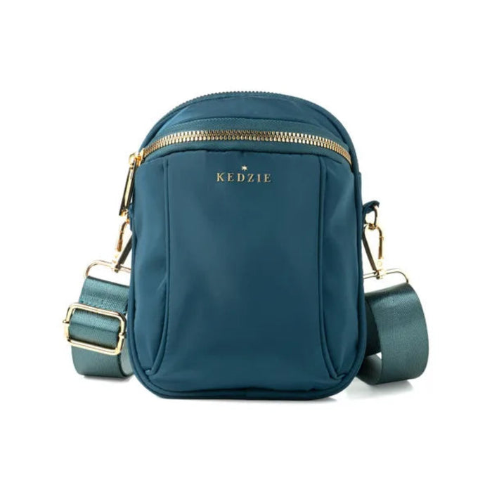 Teal crossbody bag with gold accents on a white background