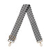 Black and white checkered bag strap with gold hardware on a white background