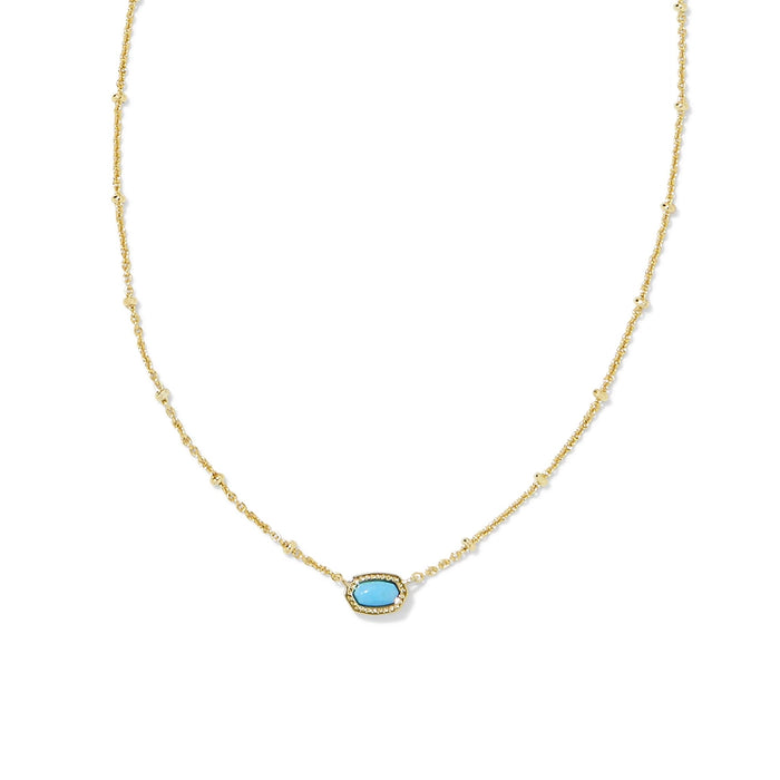 Close-up of Kendra Scott Mini Elisa turquoise magnesite pendant on gold satellite chain