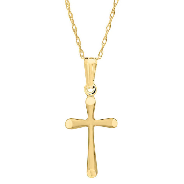 Gold cross pendant on a white background