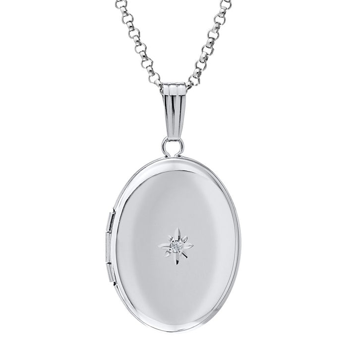 Silver locket with a diamond on a white background