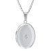Silver locket with a diamond on a white background